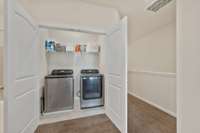 Laundry is located across the hallway from bedrooms #2 and #3.