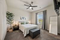 The primary suite, located on the second floor. Notice the nine foot ceilings throughout the second floor as well.