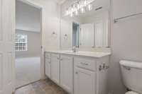 The additional bathroom for bedroom & bonus room upstairs offers both practicality and comfort, providing a convenient space for guests or family members.