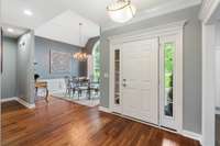 The foyer & dining presents 3/4 inch acacia wood flooring.