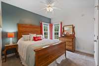 Bedroom three downstairs is brightened by elegant double windows, allowing an abundance of natural light to fill the space.