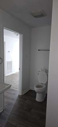 Bathroom view from washer/dryer hookup area.