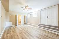 Basement workout room or hobby room. Endless possibilities. Doors lead to the backyard