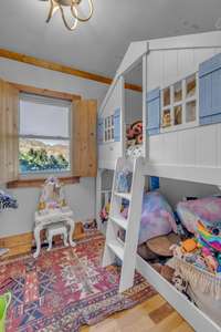 this flex room is being used as a playroom currently, but would also make a great HOME OFFICE