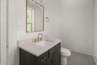 1/2 bath in space above garage