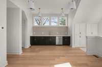 Space above 2-car garage with wet bar and dishwasher