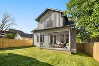 Fenced backyard green space