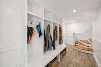 As you leave garage and enter home through daylight basement area there is a super-convenient drop zone/locker area!