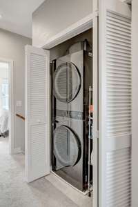 Upstairs laundry and storage closet. Washer and dryer stay with the home!