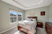 Primary bedroom with en suite bathroom and walk-in closet