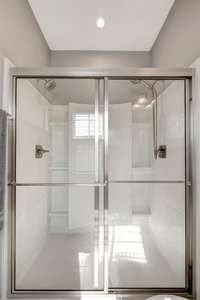 Shower in primary bedroom suite. Dual shower heads!
