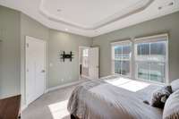 Primary bedroom with en suite bathroom and walk-in closet