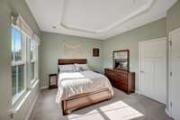 Primary bedroom with en suite bathroom and walk-in closet
