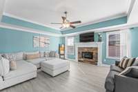 Warm gathering room with gas fireplace