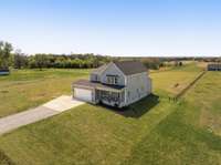 *EXTRA CONCRETE PARKING TO PARK YOUR RV/TRAILER/BOAT* SELLER ADDED EXTRA SPIGOT AND 50 AMP TO BETTER EQUIP A PARKED RV* TANKLESS WATER HEATER IN GARAGE*