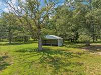 Detached carport/shed for storing all your equipment