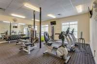 Photos of the clubhouse and fitness area.