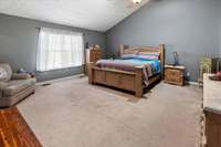 Huge master bedroom with vaulted ceiling