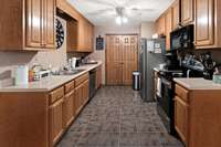Galley style kitchen with pantry