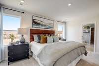 This is a photo of one of our model homes. Please know that some of the exterior and interior finishes, paint, and features may vary.