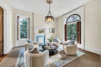 The home was originally heated with coal fireplaces. The seller has converted all of the downstairs fireplaces to remote controlled gas coal baskets. All the old radiators have been removed and three central HVAC units have been installed.