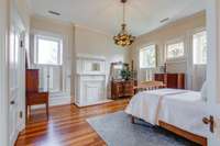 Large upstairs bedroom with stained glass and Murano Venetian glass chandelier. All the rooms are very large with lots of natural light. This room and the next are connected with a doorway and could be a large future suite.
