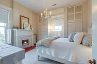 Fourth large bedroom upstairs with closets and window seat.