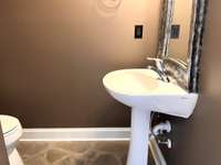 There is a half bathroom on the main level for guest use.
