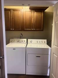 The main level includes a laundry closet equipped with additional storage space.