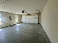 2 car extended garage w/insulated garage door.