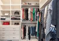 Two large walk-in closets boasts lots of shelves and drawers