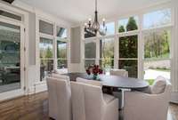 Enjoy your morning coffee in the sun-drenched breakfast room and calming views of the backyard