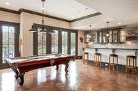 The expansive game room includes the pool table