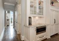 Perfect spot for a coffee bar, wine preserver, or other guilty pleasures