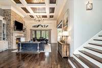 Gleaming hardwood floors flow throughout the main level