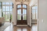 This thoughtfully curated home truly has it all from an open concept floorplan with spacious room sizes to a secluded resort-style pool + outdoor living vista to a walk-out lower level that includes a media room, FR with a full wet bar and wine room