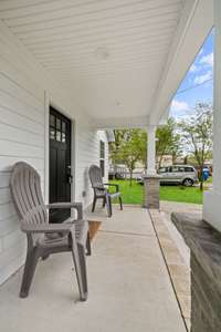 Keep your packages and visitors dry on this covered porch!