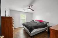 Your beautiful floors and ceiling fan design continue into your Primary Suite!