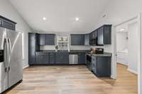 Another view of your private laundry room conveniently located just off the kitchen to make multitasking an absolute breeze!