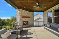 This space features a built-in gas fireplace for cozy evenings.