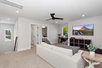 An upstairs loft offers additional flexible living space tha can serve as a media room play area, game room or even a second office.