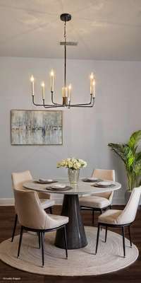 This condo is NOT furnished! This is a virtually furnished photo of the room!