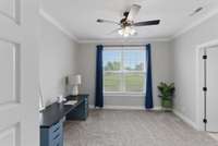2nd bedroom on first floor with private full bathroom.  Could be used as an office space.