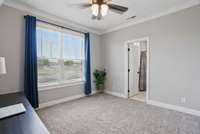 2nd bedroom on first floor with private full bathroom.  Could be used as an office space.