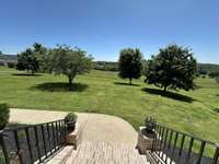 The view from the front porch is wonderful. Home located in a quiet, private community.