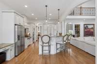 Wonderful Kitchen layout, so much storage! Gas cooktop. Island. Pantry. Even a built in desk.