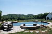 Fabulous view of the countryside from the pool, hot tub and firepit area.