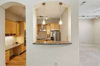 Take another peak at the kitchen from the Dining Area.  This gives you a view into the Living Room as well.  Open for a good flow!