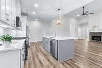 Dual-tone cabinets in kitchen! Island has cabinets on front and back sides