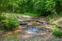 Beautiful waterfall on the property!